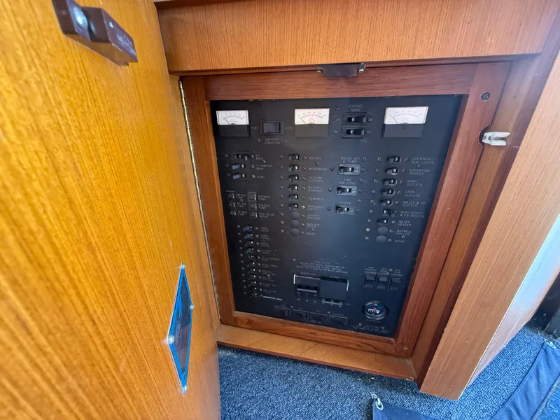 Slide: The Image of Electrical panel inside a 1999 Ocean Yachts 40 Super Sport boat. - 23