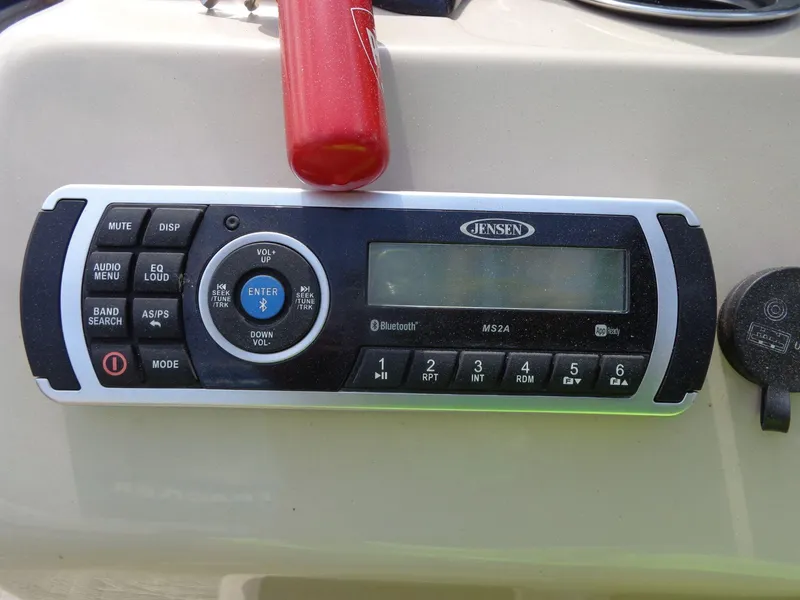 Slide: The Image of Jensen MS2A stereo system on 2019 Sun Tracker Fishin' Barge 22 DLX boat dashboard. - 30