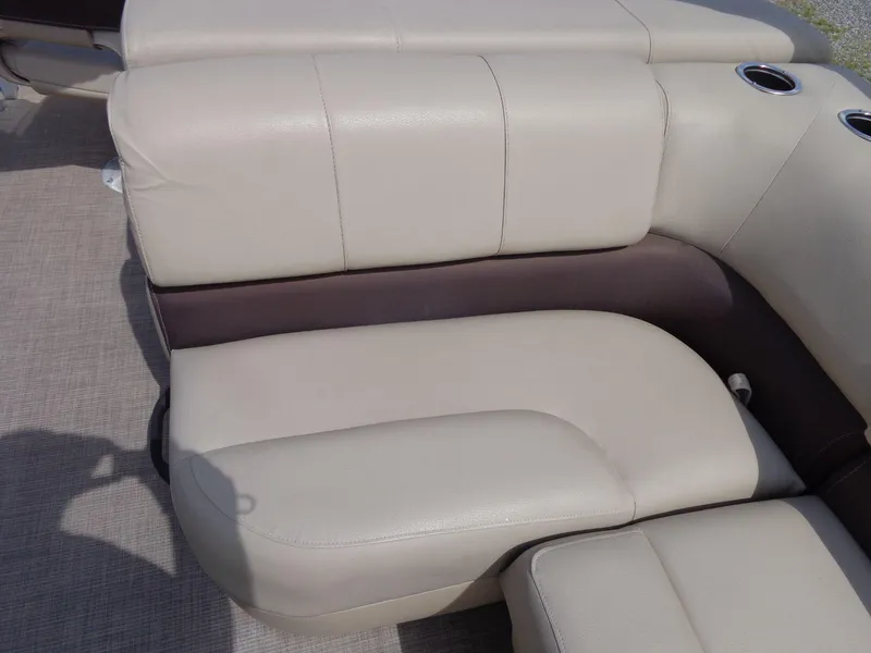 Slide: The Image of Beige seating on 2019 Sun Tracker Fishin' Barge 22 DLX with cup holders. - 38