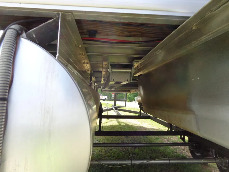 Slide: The Image of Underneath view of a 2019 Sun Tracker Fishin' Barge 22 DLX pontoon boat. - 6