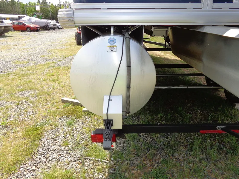 Slide: The Image of 2019 Sun Tracker Fishin' Barge 22 DLX pontoon boat trailer detail. - 7