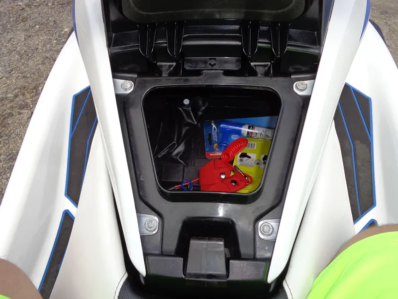 Slide: The Image of Open storage compartment of 2019 Yamaha FX Cruiser HO with accessories inside. - 13