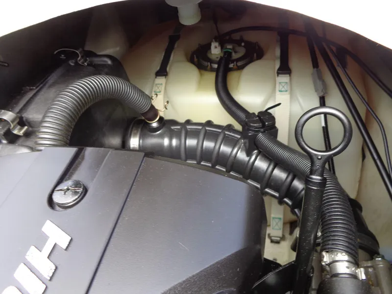 Slide: The Image of 2019 Yamaha FX Cruiser HO engine compartment with visible hoses and components. - 23