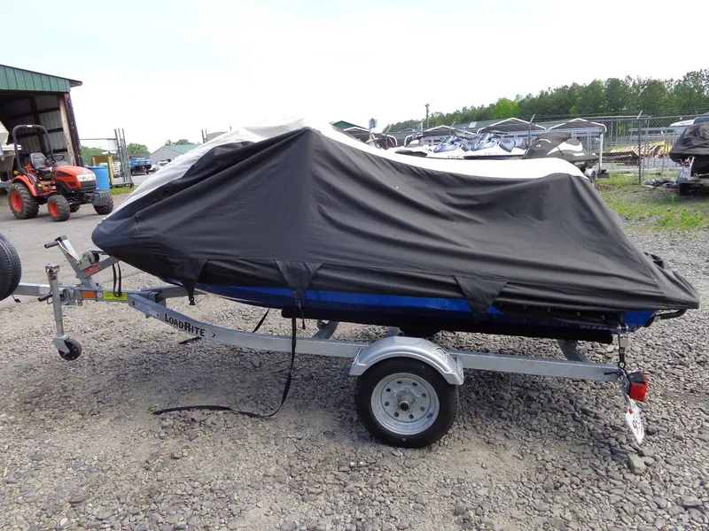 Slide: The Image of 2019 Yamaha FX Cruiser HO covered on trailer in outdoor storage area. - 33
