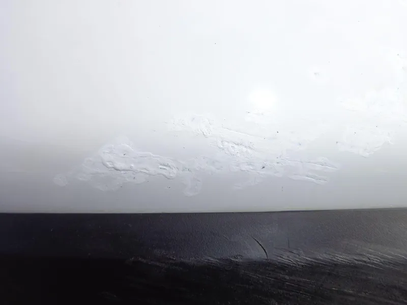 Slide: The Image of Close-up of 2019 Yamaha FX Cruiser HO hull with surface imperfections. - 5