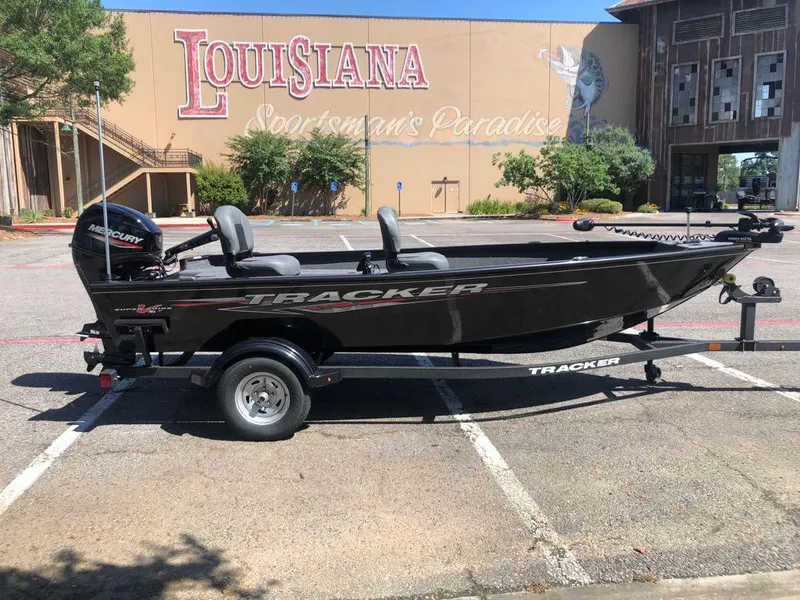 Slide: The Image of 2025 Tracker Super Guide V-16 T boat parked in front of Louisiana Sportsman's Paradise. - 5
