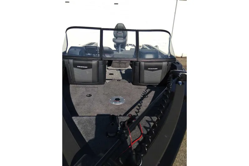 Slide: The Image of 2025 Tracker Targa V-18 WT boat interior with dual consoles and seating. - 27