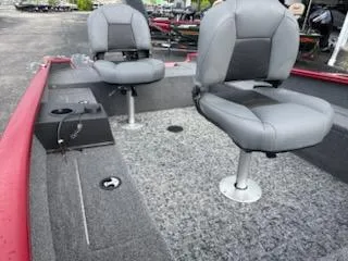 Slide: The Image of 2025 Tracker Super Guide V-16 T boat interior with two gray seats. - 5