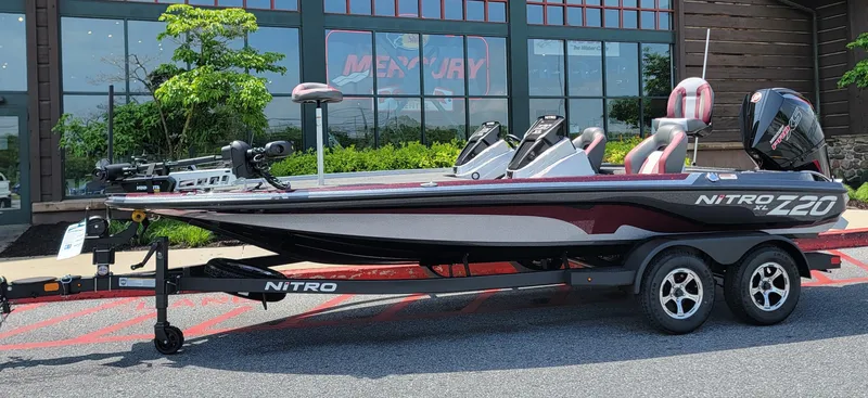 Slide: The Image of 2025 Nitro Z20 XL Pro boat on trailer, parked outdoors. - 1