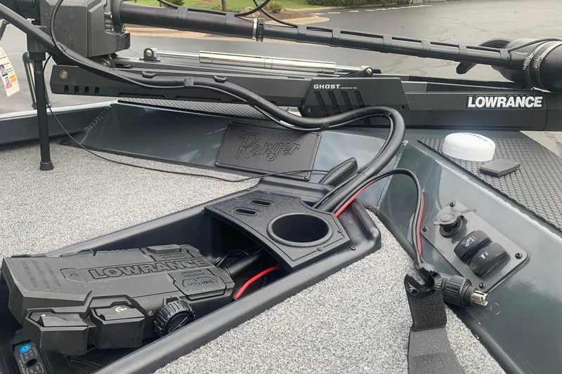 Slide: The Image of 2025 Ranger RT188 boat deck featuring Lowrance electronics and Ghost trolling motor. - 4