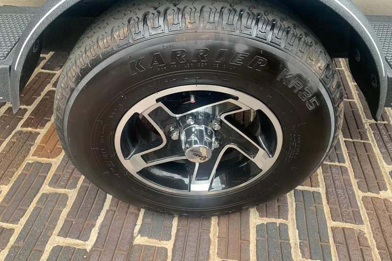 Slide: The Image of 2025 Ranger RT188 wheel with Karrier KR35 tire on brick pavement. - 8