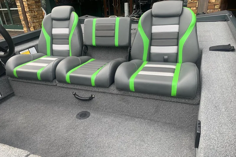 Slide: The Image of 2025 Ranger RT188 boat seats with green and gray upholstery, showcasing modern design. - 6