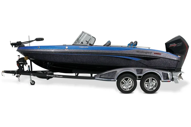 Slide: The Image of 2025 Ranger 2080MS boat with powerful outboard motor, parked on a trailer. - 2