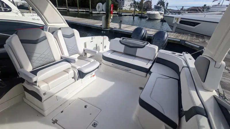 Slide: The Image of 2020 Chaparral 280 OSX boat interior with luxurious seating and modern design. - 12
