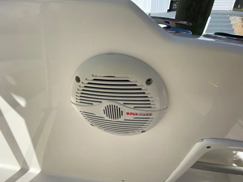 Slide: The Image of Speaker on 2011 Pursuit C 200 Center Console boat, featuring Boss Audio branding. - 36