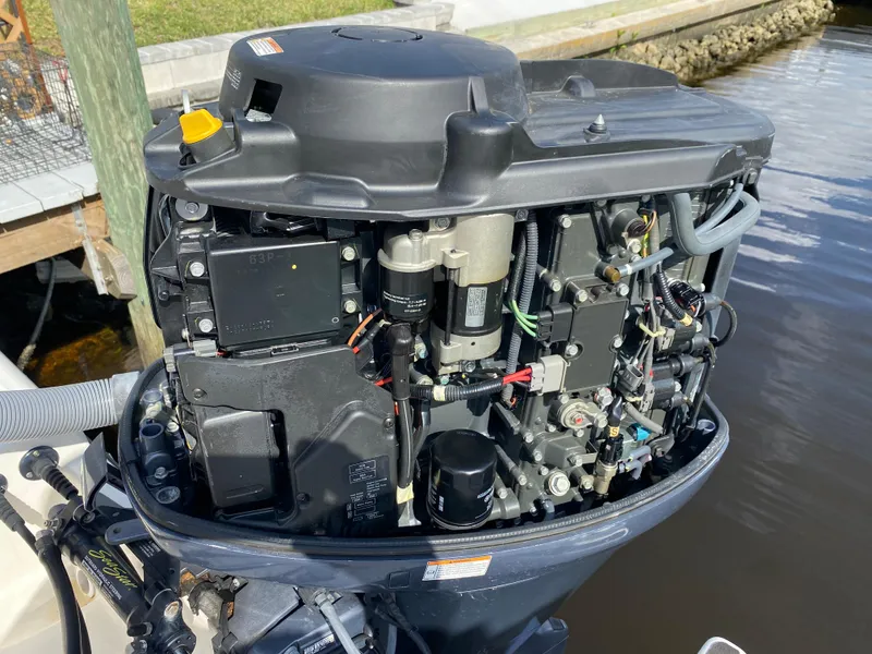 Slide: The Image of 2011 Pursuit C 200 Center Console boat engine, detailed view of internal components. - 39