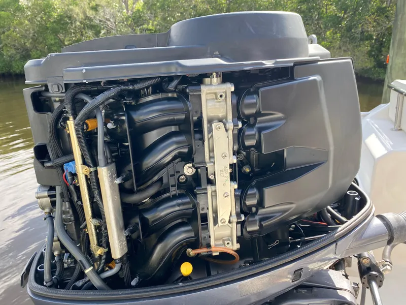 Slide: The Image of 2011 Pursuit C 200 Center Console boat engine, detailed view, outdoors. - 41