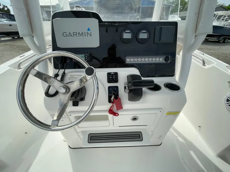 Slide: The Image of Control panel of 2019 Tidewater 220 CC Adventure boat with Garmin navigation system. - 23