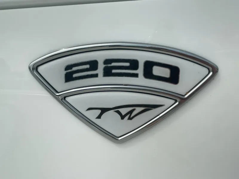 Slide: The Image of 2019 Tidewater 220 CC Adventure emblem on white background. - 3