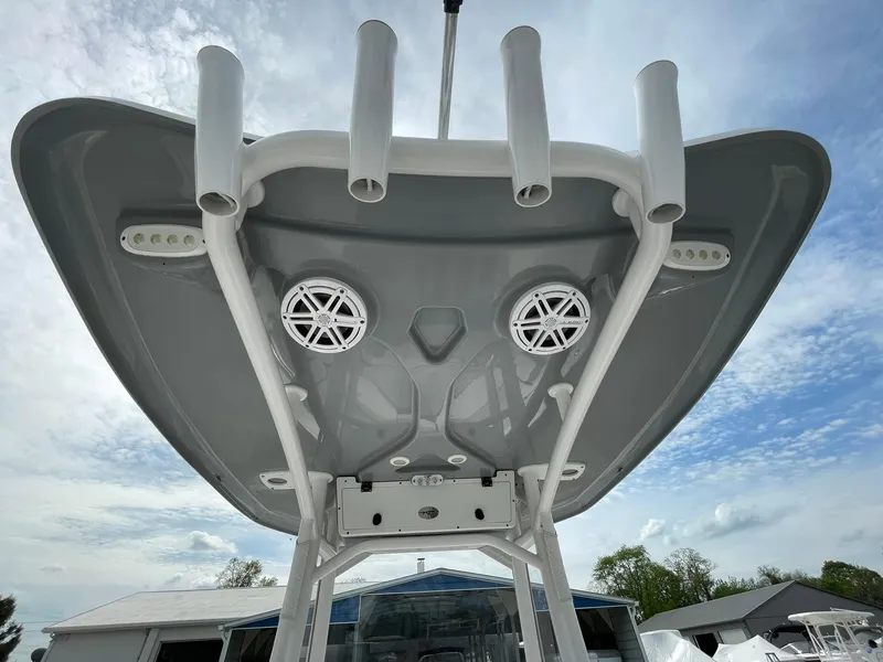 Slide: The Image of 2019 Tidewater 220 CC Adventure boat top view with rod holders and speakers. - 30