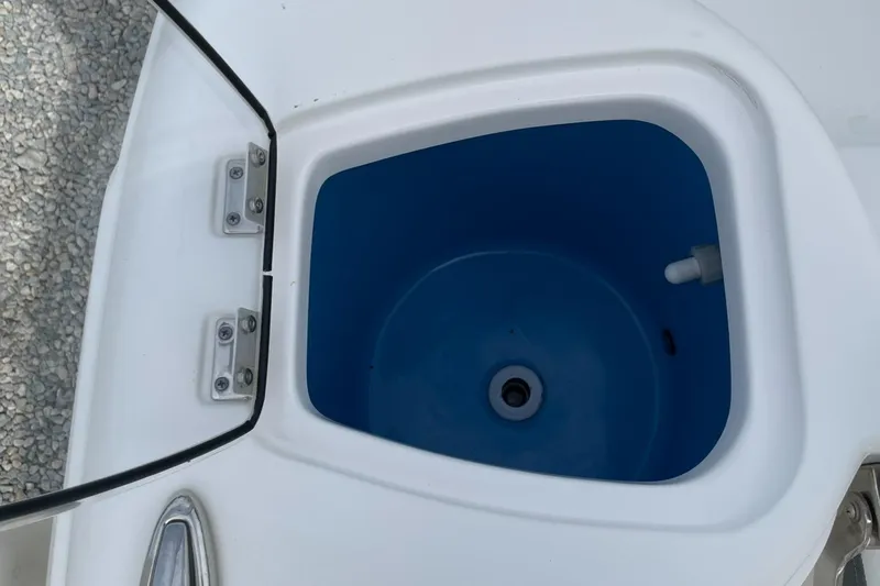Slide: The Image of Livewell compartment on a 2019 Tidewater 220 CC Adventure boat. - 34