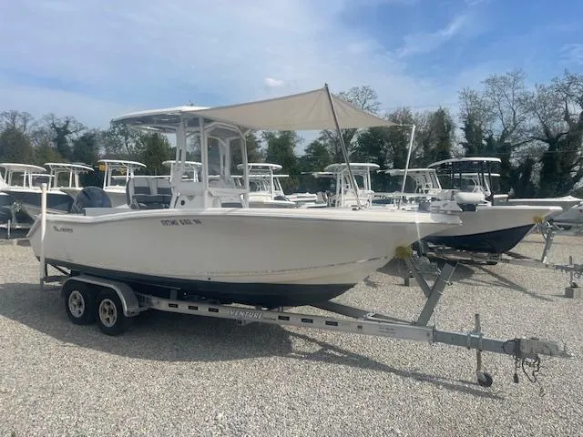 Slide: The Image of 2019 Tidewater 220 CC Adventure boat on trailer in outdoor lot. - 44