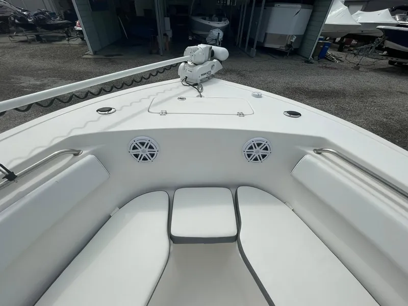 Slide: The Image of 2019 Tidewater 220 CC Adventure boat interior with seating and speakers. - 5