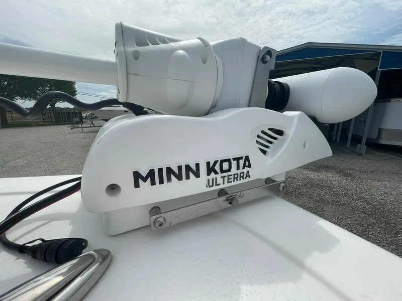 Slide: The Image of Minn Kota Ulterra motor on 2019 Tidewater 220 CC Adventure boat, outdoor setting. - 7
