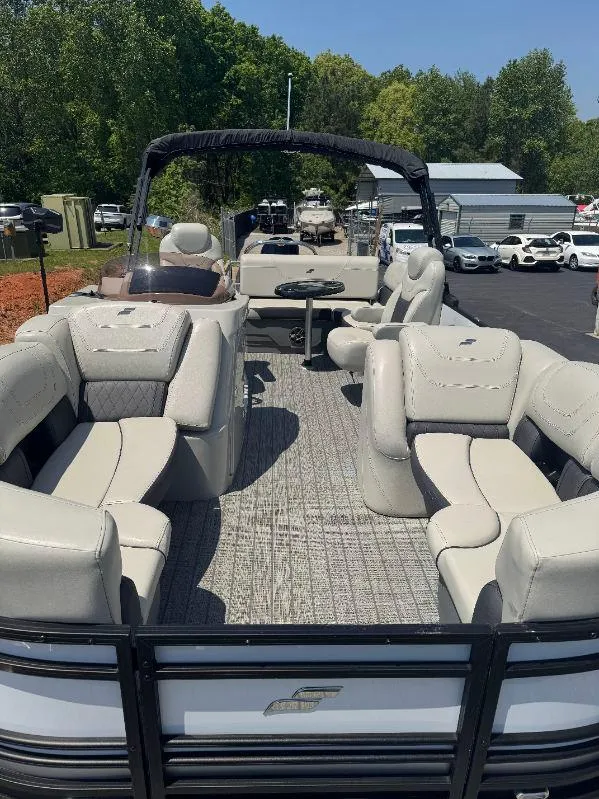 Slide: The Image of 2022 Starcraft SLS 3 Q DH pontoon boat with spacious seating and modern design. - 10