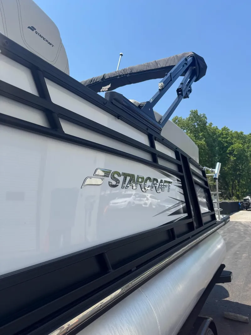Slide: The Image of 2022 Starcraft SLS 3 Q DH pontoon boat, side view, outdoors. - 11