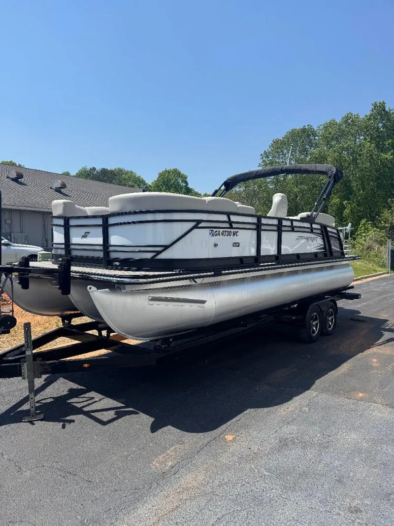 Slide: The Image of 2022 Starcraft SLS 3 Q DH pontoon boat on trailer, parked outdoors. - 13