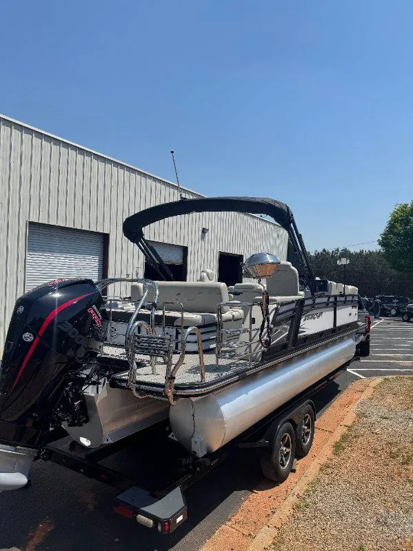 Slide: The Image of 2022 Starcraft SLS 3 Q DH pontoon boat with outboard motor on trailer. - 8