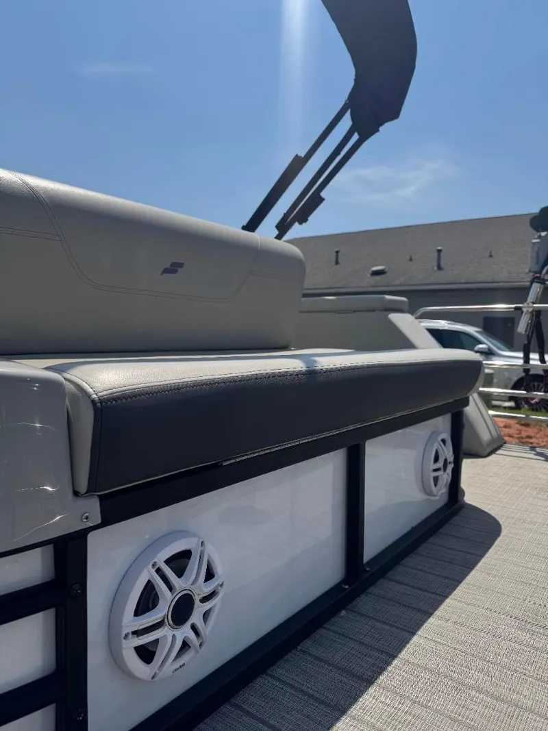 Slide: The Image of 2022 Starcraft SLS 3 Q DH boat with cushioned seating and built-in speakers. - 9