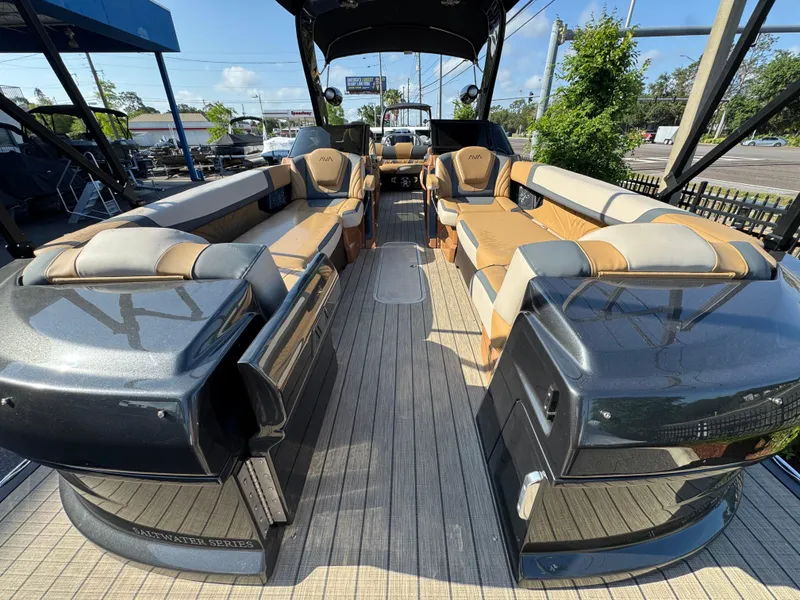Slide: The Image of Luxurious 2025 Avalon Excalibur 27' boat interior with spacious seating and sleek design. - 10
