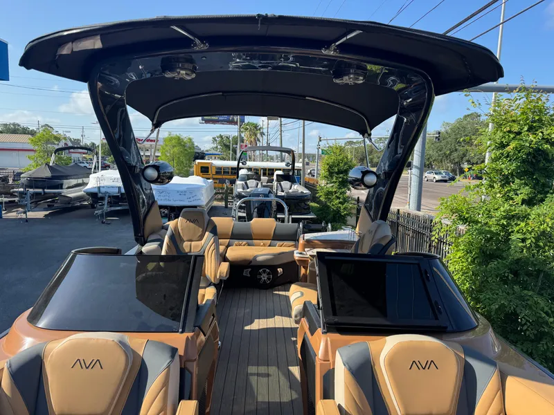 Slide: The Image of Luxurious 2025 Avalon Excalibur 27' boat with sleek design and spacious seating. - 15