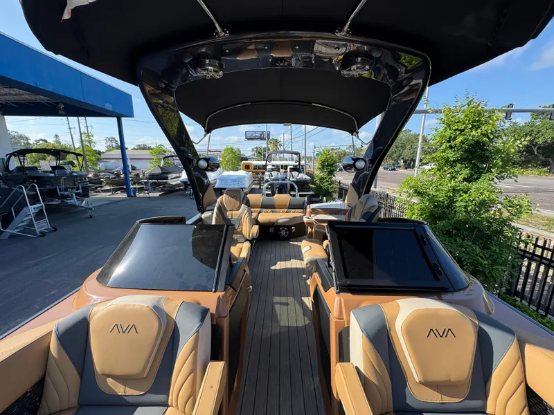 Slide: The Image of Luxurious 2025 Avalon Excalibur 27' boat with spacious seating and sleek design. - 16