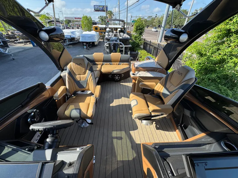 Slide: The Image of Luxurious 2025 Avalon Excalibur 27' boat interior with plush seating and sleek design. - 17