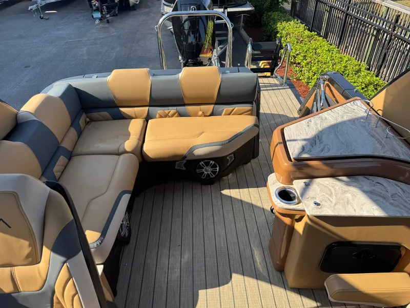 Slide: The Image of Luxurious 2025 Avalon Excalibur 27' boat interior with plush seating and modern amenities. - 20