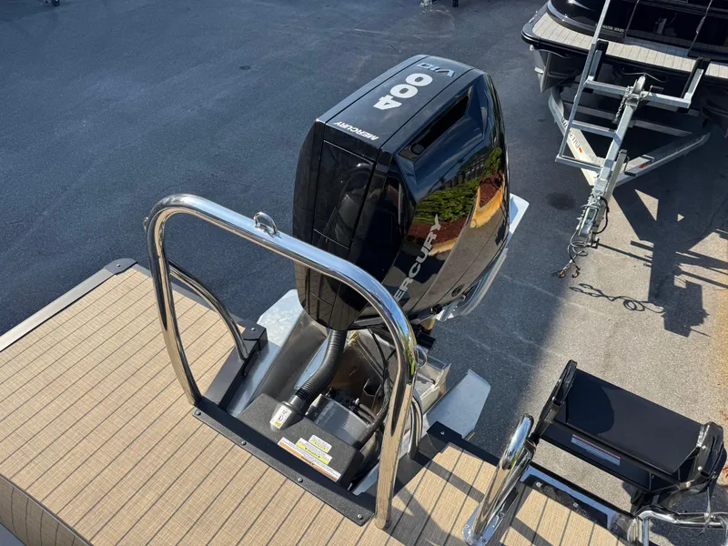 Slide: The Image of 2025 Avalon Excalibur 27' boat with powerful 400 HP outboard motor. - 22