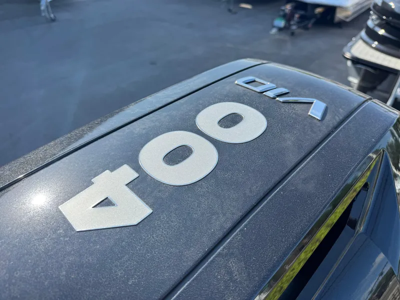 Slide: The Image of Close-up of Avalon Excalibur 27' 2025 boat engine with "400" and "V10" labels. - 23