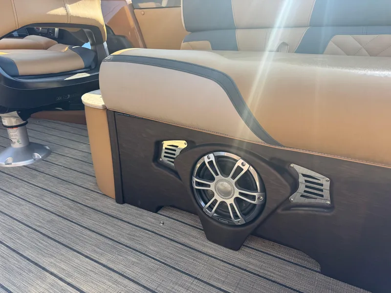 Slide: The Image of Luxurious 2025 Avalon Excalibur boat interior with premium seating and integrated speaker system. - 30