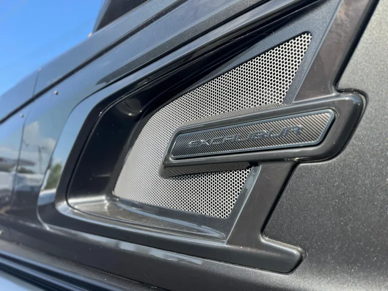 Slide: The Image of 2025 Avalon Excalibur 27' boat detail with sleek design and modern grille. - 5