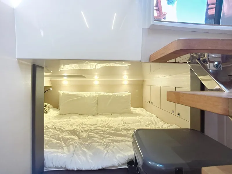 Slide: The Image of Interior cabin of 2019 SACS Rebel 40 yacht with cozy bed and modern design. - 28