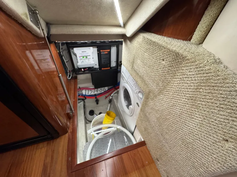 Slide: The Image of 23 2004 Sea Ray 390 Under Stairs Laundry - 24