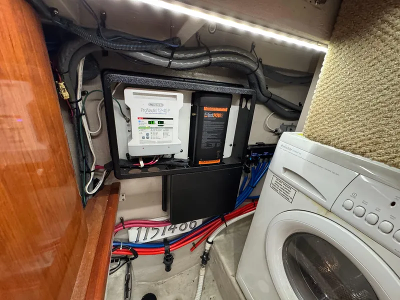 Slide: The Image of 24 2004 Sea Ray 390 Under Stairs Laundry - 25