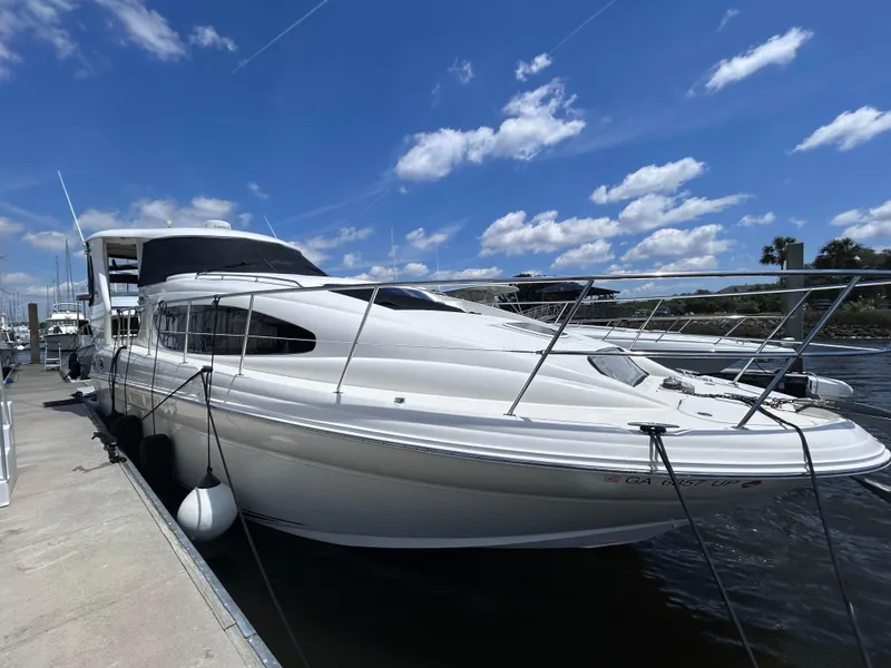Slide: The Image of 3 2004 Sea Ray 390 Exterior Starboard Side - 5
