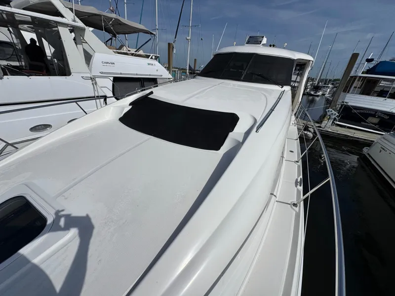 Slide: The Image of 54 2004 Sea Ray 390 Bow Port Side - 56