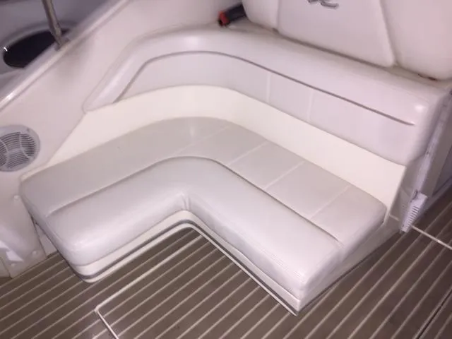 Slide: The Image of White leather seating on 1990 Sea Ray 390 Express Cruiser boat. - 17