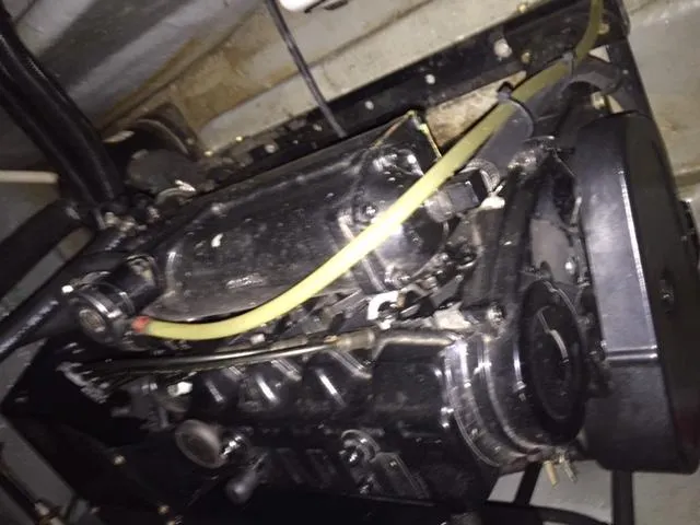 Slide: The Image of Engine of a 1990 Sea Ray 390 Express Cruiser, showcasing mechanical components. - 19