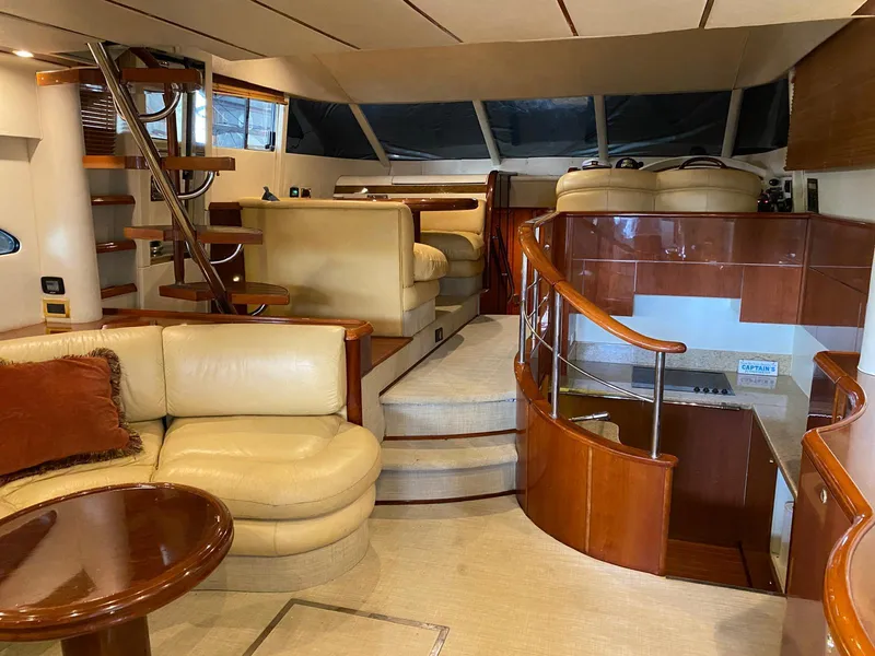 Slide: The Image of Luxurious interior of 2001 Fairline Squadron 55 yacht with elegant seating and wooden finishes. - 20